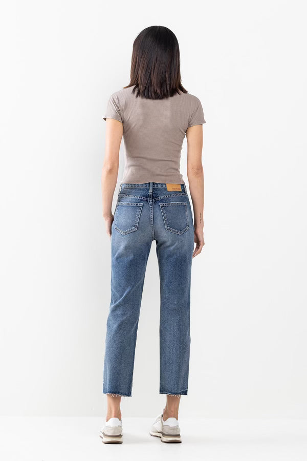 Everyone's Favorite Jeans. High rise straight jeans with distressed knee. Zipper front with button closure