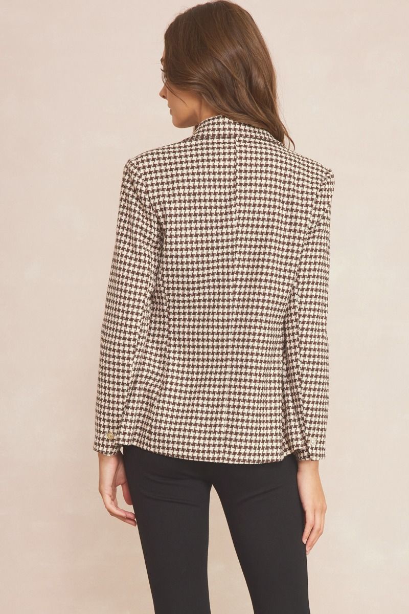 Take a risk in the All of a Sudden Jacket! This stylishly bold houndstooth blazer features button detailing, pockets, and inner lining, offering you the perfect combination of sophistication and comfort. Make an impact and face every challenge with confidence. Pair with the matching shorts to complete this set!