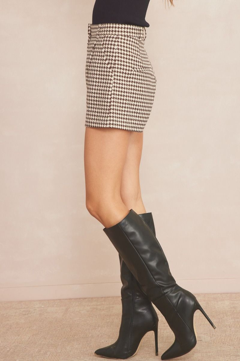 Take a stylish risk in the All of a Sudden Shorts. These houndstooth high waisted shorts feature pockets at front and back, belt loops, and a zipper front closure. Lined and lightweight, these shorts will have you ready to take on any challenge! Pair with the matching blazer jacket to complete the set!