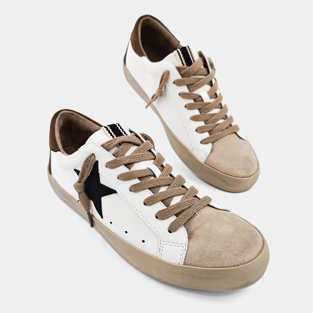 Introducing our vintage-inspired sneaker, PAMELA! With a round toe and sturdy sole, they're perfect for any outfit. Their contrasting color panels make them stand out and are sure to add a touch of personality to your wardrobe. Try them with jeans or dresses for a versatile and stylish look!