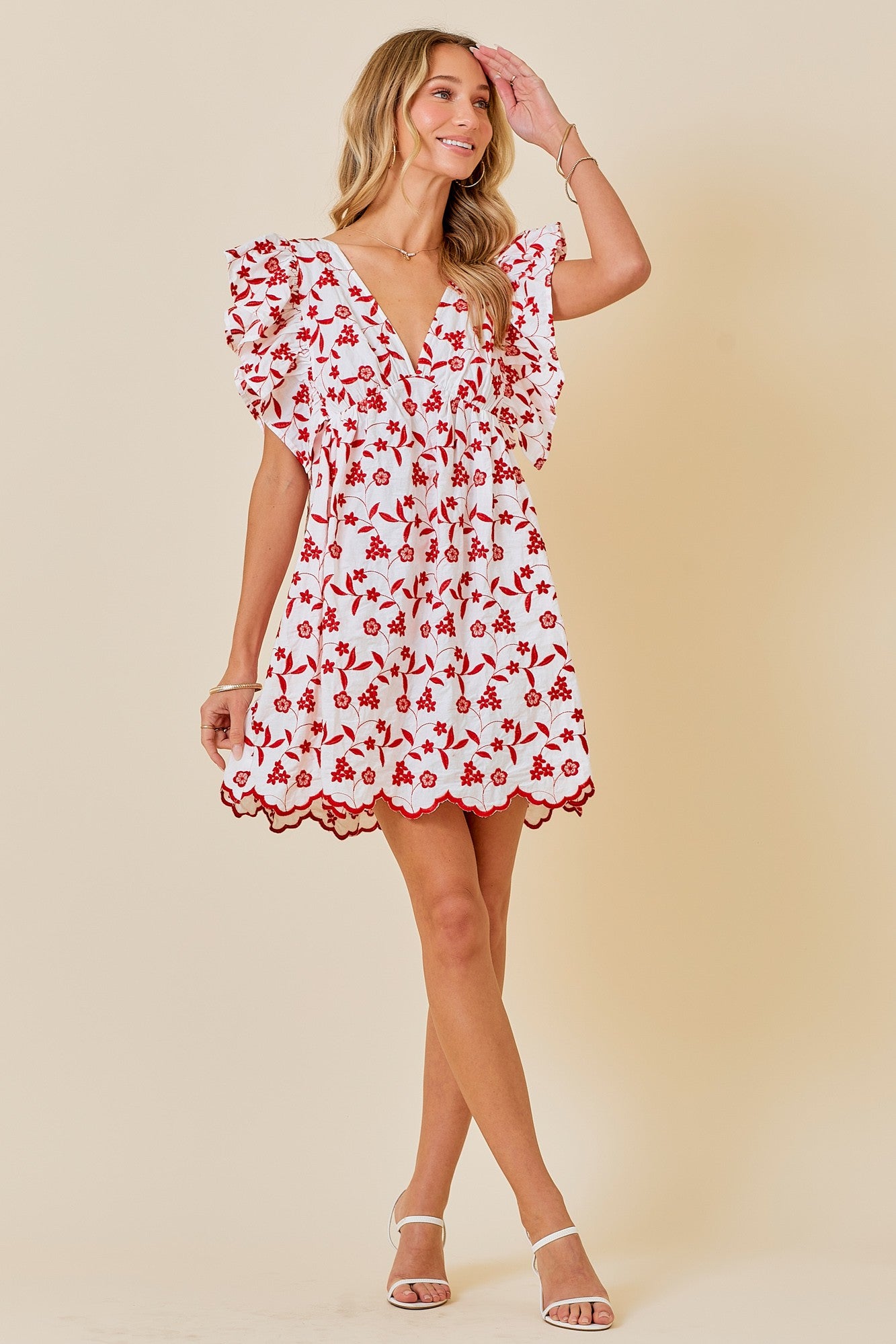 Elevate your game day style with our cotton lace eyelet dress! Perfectly paired with your favorite boots, this dress exudes confidence and charm. Cheer on your team in comfort and style.