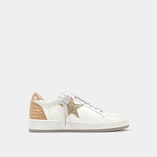 PAZ is one of our favorite must-have retro sneaker, with a low top upper body crafted in faux leather, synthetic snakeskin and glitter in contrasting white and taupe accents. These look amazing paired with shorts, cropped jeans and dresses.