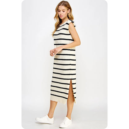 Channel your inner beach babe with the Beach Vibes Dress! This sleeveless knit dress features shoulder pads for a chic touch, while the textured striped design adds unique flair. Perfect for a day at the beach or a night out on the town.