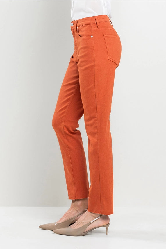 These aren't just jeans; they're your next obsession. Whether you're dressing up or keeping it casual, these high-rise wonders are the perfect choice. Embrace the blend of fashion and comfort with your new go-to. Upgrade your wardrobe with these amazing burnt orange jean by SneekPeek!