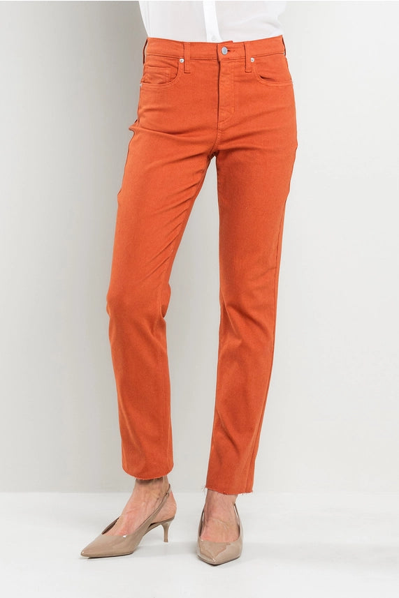 These aren't just jeans; they're your next obsession. Whether you're dressing up or keeping it casual, these high-rise wonders are the perfect choice. Embrace the blend of fashion and comfort with your new go-to. Upgrade your wardrobe with these amazing burnt orange jean by SneekPeek!