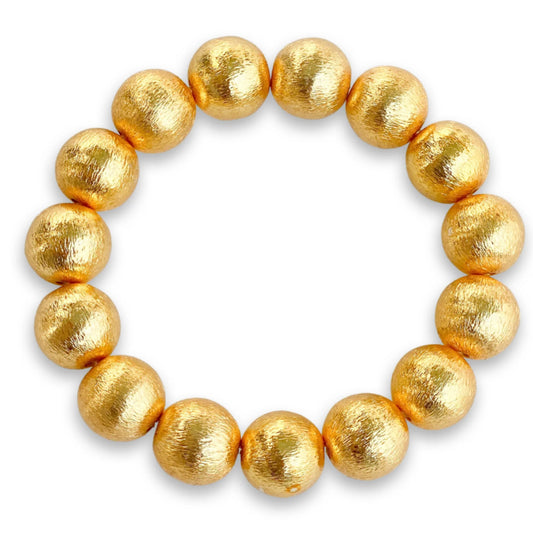 Elevate any outfit with these beautiful bracelets! They are made out of brushed gold plated copper beads.  7" long  Stretchy Elastic  12mm beads  Look great if you stack them!