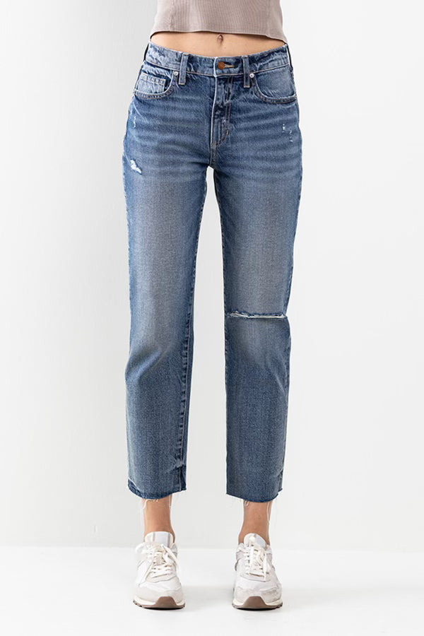 Everyone's Favorite Jeans. High rise straight jeans with distressed knee. Zipper front with button closure
