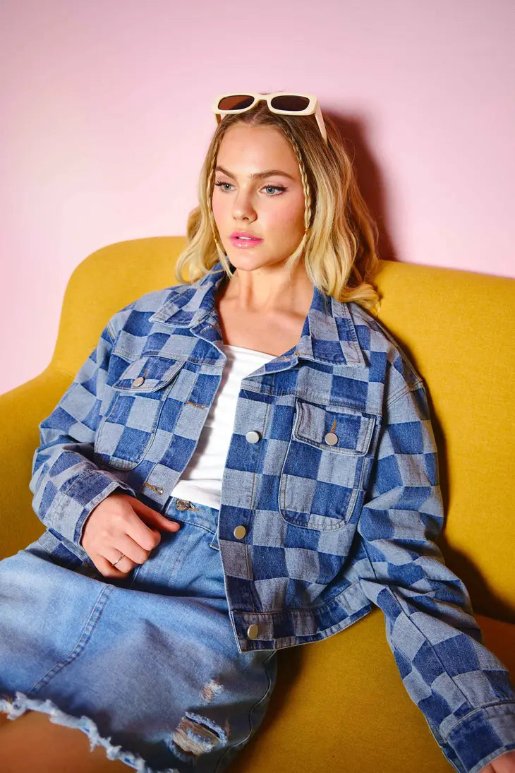 Check Yes Jacket. Checkered button up crop denim jacket with plaid pattern. Cropped above the waist with button pockets. The perfect combination of classic and contemporary style, this jacket is sure to be a staple in your wardrobe. Crafted from high-quality denim, the luxurious feel will provide you with the utmost comfort for any casual occasion.