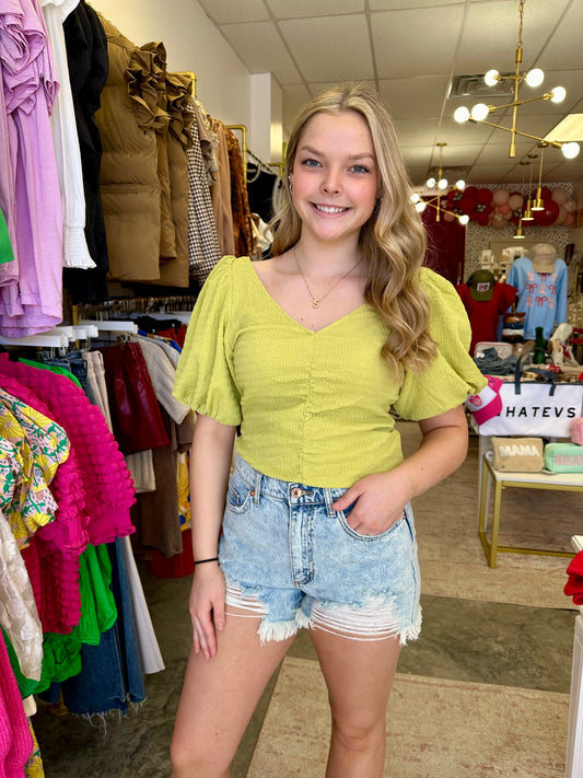Get ready to soak up the sun in the Sunshine Please Top! Made with stretchy material, this top will move with you wherever you go. The playful puffy sleeves and elastic arms add a touch of whimsy to your look.