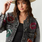 Elevate your game day style in our Game Day Jacket, a dazzling expression of team spirit. Rhinestone patches dazzle & catch the light, button-down closure ensures fit & layers. Pockets store essentials. Raw hem, cropped length adds edgy style. Perfect for a confident, fashion-forward look.