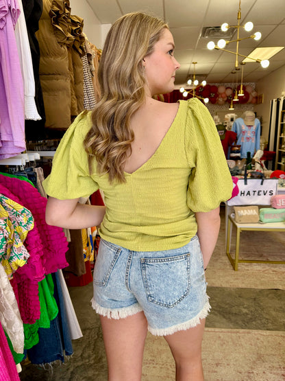 Get ready to soak up the sun in the Sunshine Please Top! Made with stretchy material, this top will move with you wherever you go. The playful puffy sleeves and elastic arms add a touch of whimsy to your look.