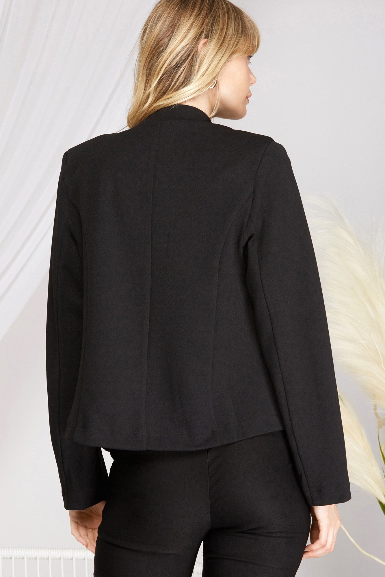 Introducing, Daring Stares Jacket, the closet must-have that says it all without uttering a word. Look sharp and show off your style with this classic blazer. Open front black blazer