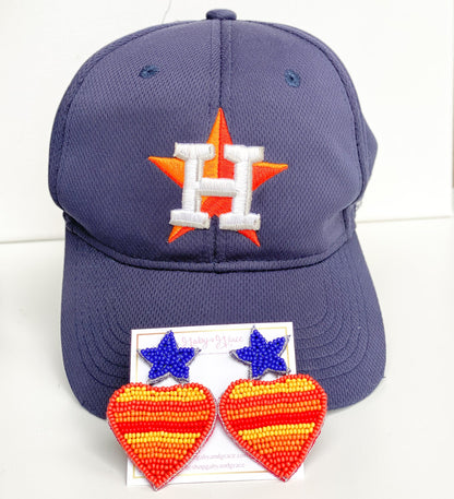 Go, Houston Astros! Cheer and show your love for the Astros baseball team in style with our custom design beaded Astros earrings in the shape of a heart with the Astros Vintage Colors and a blue star as a stud.