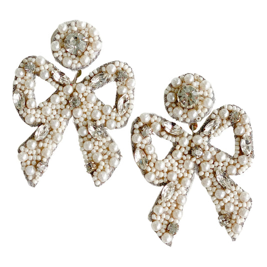 The Most Beautiful Beaded Bow Earrings! Add elegance, and grace to your Holiday outfit with these handcrafted bow earrings made with crystals, beads, and silk thread. They have a perfect size! Exclusively made by our talented artisans.