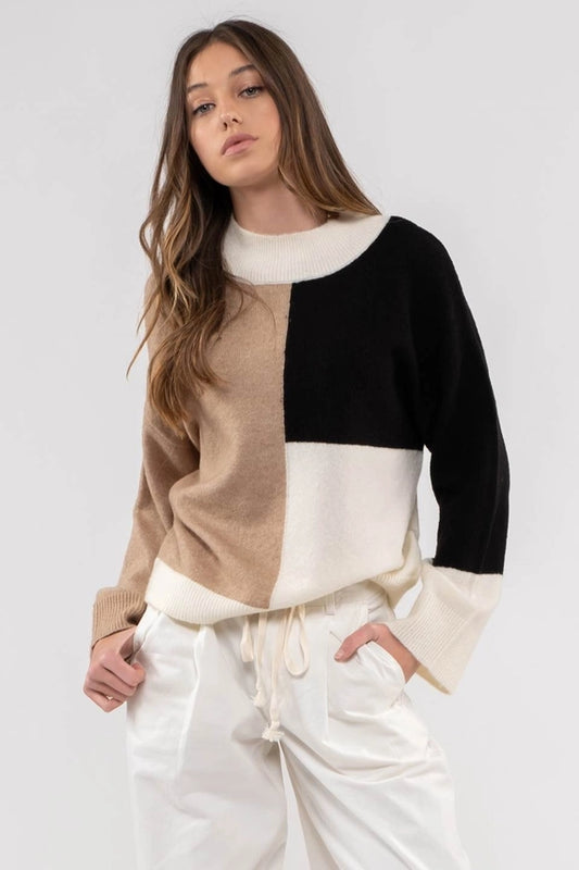 Be the life of the party in the Fireside Sweater! This colorblock delight is the perfect lightweight sweater for any occasion—who doesn't love a sweater that goes with everything? Get cozy in style this season!