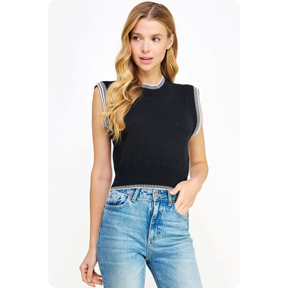 Spice up your wardrobe with our Sweetly Surprised Top! This embroidered sleeveless tank combines comfort with style, thanks to its stretch knit fabric. Perfect for any occasion, this top will add a playful and quirky touch to any outfit. 
