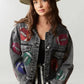Elevate your game day style in our Game Day Jacket, a dazzling expression of team spirit. Rhinestone patches dazzle & catch the light, button-down closure ensures fit & layers. Pockets store essentials. Raw hem, cropped length adds edgy style. Perfect for a confident, fashion-forward look.