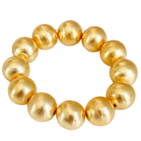 Elevate any outfit with these beautiful bracelets! They are made with brushed gold-plated copper beads.  7" long Stretchy Elastic 16mm beads Looks great if you stack them!