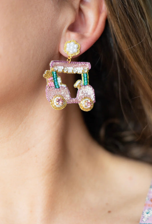 The Golf Cart Earrings are perfect for any golf enthusiast who wants to look in style while playing the sport or attending any golf event.  These earrings feature a golf cart with very intricate work and attention to detail by our artisans using beads, silk thread, pearls and stones in subtle colors that will match many outfits.