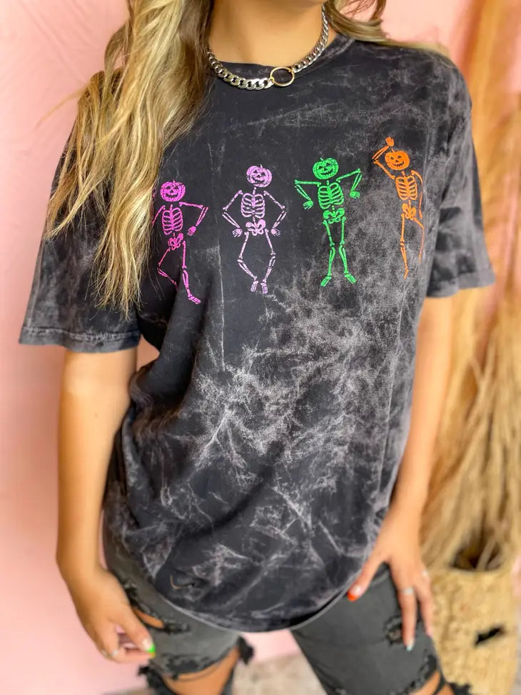 Give your Halloween wardrobe an upgrade with this Dancing Skeletons Tee! Made from 100% combed ringspun cotton and mineral washed for that classic, vintage feel, this unisex tee is sure to 'boo-tify' your closet! Flaunt your favorite spooky style this season!