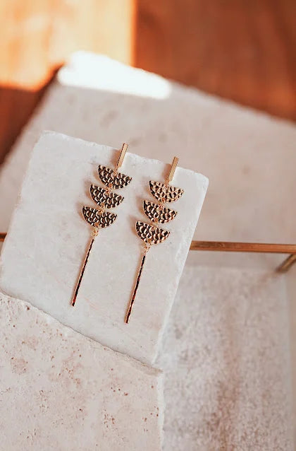 These Half Moon Earrings are so fun! Fashionably crafted with non-tarnishing 24kt gold plating these earrings are designed to last. Hypoallergenic and water-resistant, they measure 3" long. 