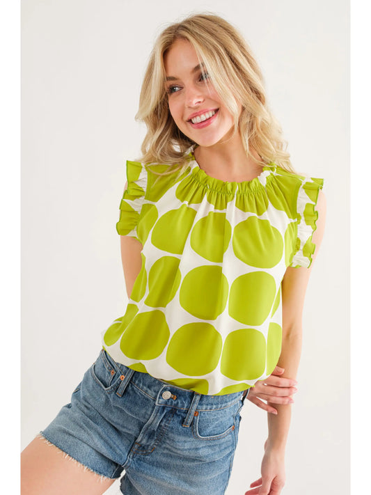Chartreuse Polka dot knit fabric with a mock neck and sleeveless ruffles.