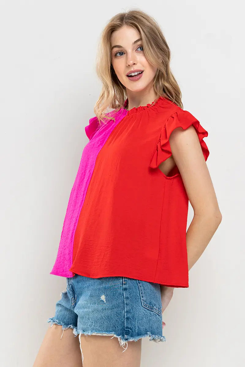 The Sunny Days top will have you smiling brighter - a cheerful color block, sleeveless woven number with ruffles at the neck and sleeves! You'll be feeling like a ray of sunshine in this wardrobe pick me up. Show off your playful and cheery side in this comfy and stylish top!  Pair with shorts for an effortless look or dress pants to take this look to your office. This versatile top will turn heads in any environment. 