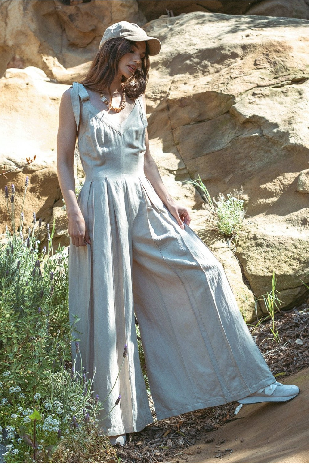 Live it up in comfort with our High Life Jumpsuit! Featuring a linen stitch and wide leg design, this jumpsuit offers maximum comfort and style. Perfect for any occasion, this jumpsuit is sure to be your go-to outfit for a fun and playful look!