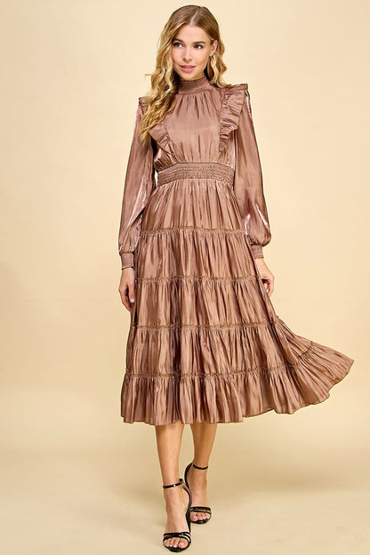 Falling head-over-heels for this Love You Latte dress! Our mock neck, tiered ruffle midi dress is the perfect blend of stylish and comfortable. With an elastic waistband, ruffle details on the long sleeves, and a back keyhole, you'll look amazing (and feel amazing, too)!