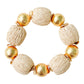 Elevate any outfit with these beautiful bracelets! They are made out of brushed gold plated copper beads and hand wrapped raffia beads.  7" long  Stretchy Elastic  14mm beads  Look great if you stack them!