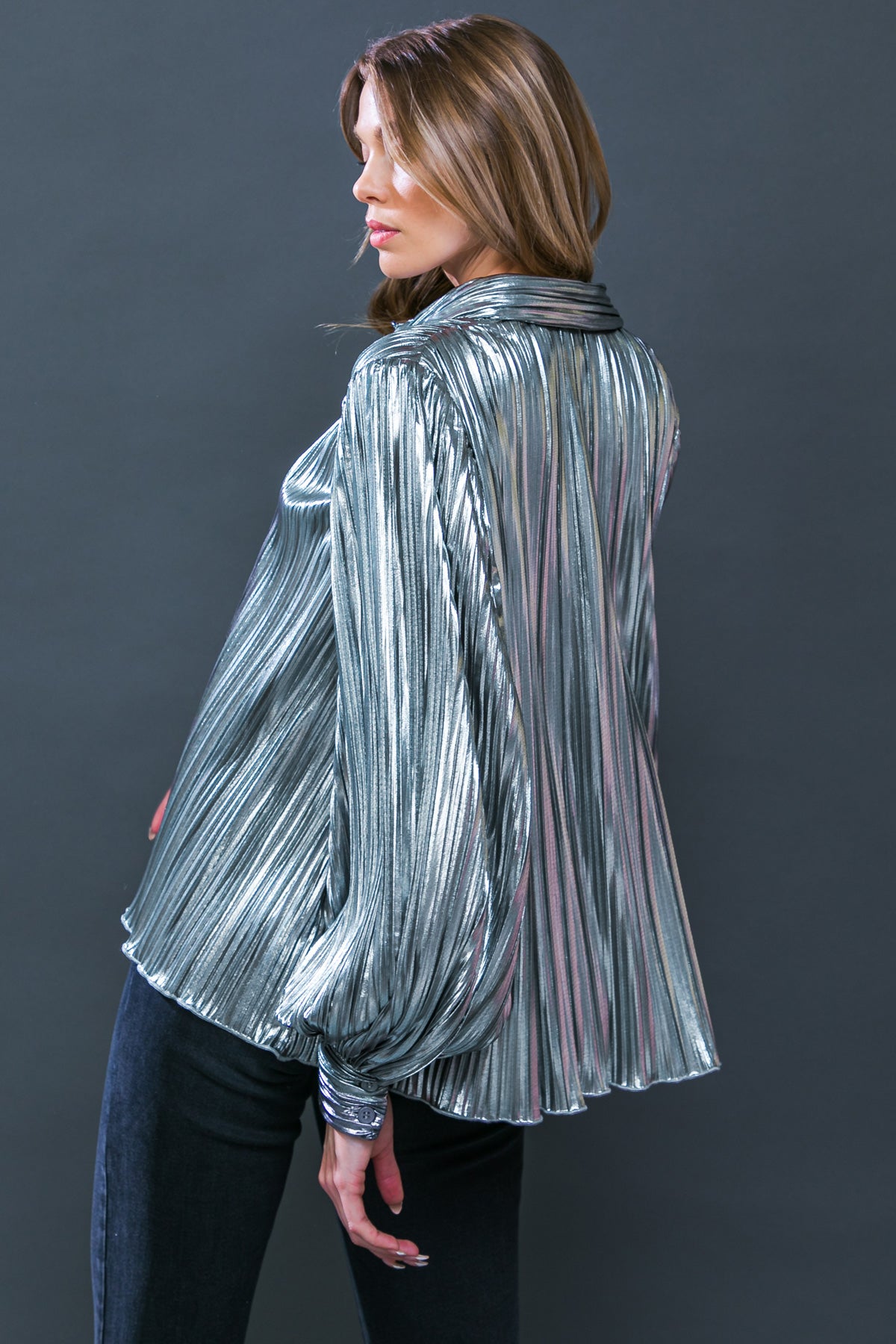 Rock the party with the Cheers! Top! This sparkling pleated piece features a classic shirt collar fit, button down closure, and long sleeves with cuffs for a look that will shut it down. Shine bright and show up in style for your next night out!