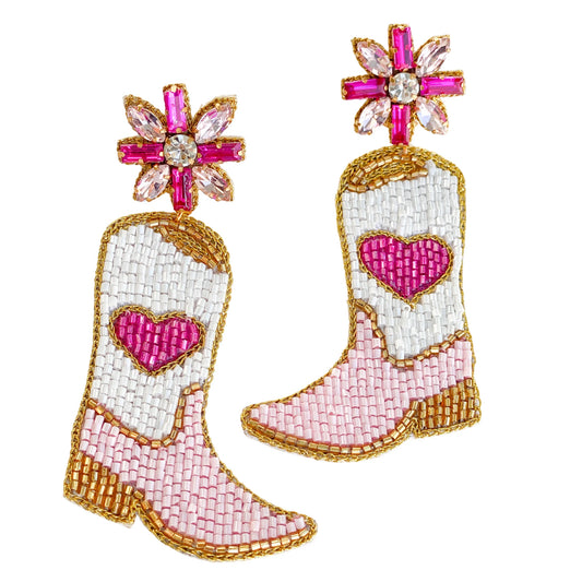 Cowgirls wear Pink! Our original design of these pink cowgirl boot earrings are the perfect addition to your western outfit. Made out of pink, white and gold glass beads with sparkly stones they will add the perfect amount of shimmer!
