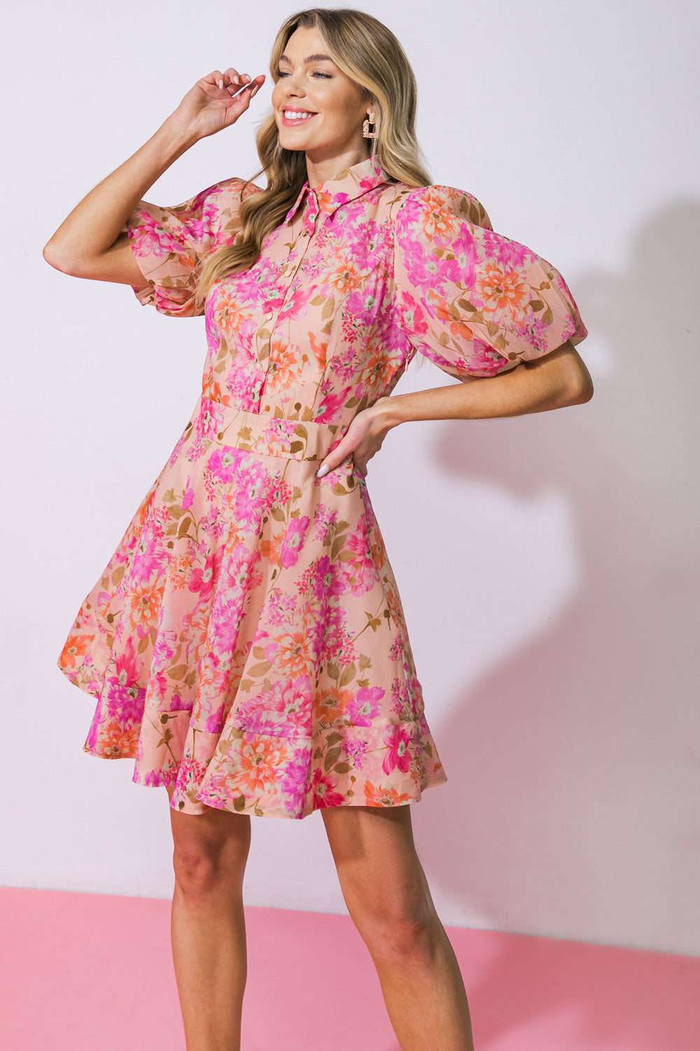 Unleash your playful side with this printed woven mini dress! Featuring a stylish shirt collar and functional button down, this dress is both trendy and practical. The short puff sleeves add a touch of femininity, while the full skirt and side zipper closure ensure a perfect fit. Get ready to turn heads and make a statement in this unique and fun dress!