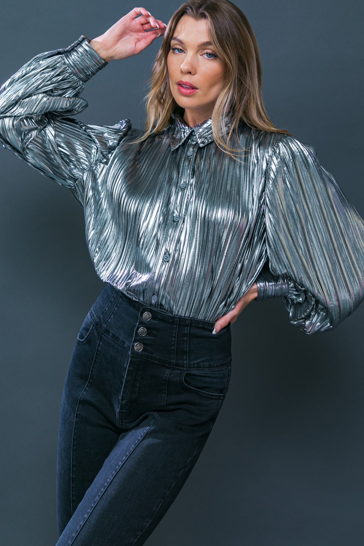 Rock the party with the Cheers! Top! This sparkling pleated piece features a classic shirt collar fit, button down closure, and long sleeves with cuffs for a look that will shut it down. Shine bright and show up in style for your next night out!