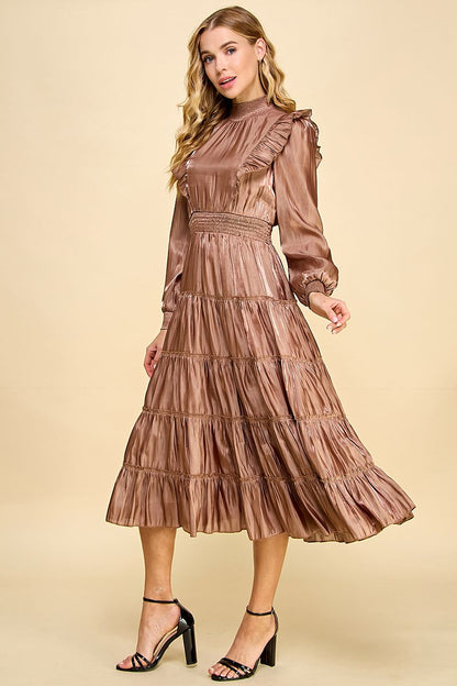 Falling head-over-heels for this Love You Latte dress! Our mock neck, tiered ruffle midi dress is the perfect blend of stylish and comfortable. With an elastic waistband, ruffle details on the long sleeves, and a back keyhole, you'll look amazing (and feel amazing, too)!