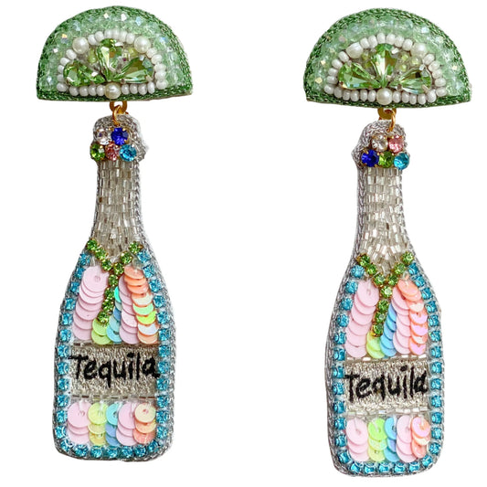 Our Custom Designed Tequila Bottle is sparkly, fun and filled with multicolored striped sequins. They make a great accessory to wear on 5 de Mayo, during the summer, any beach vacation here or a destination in Mexico.