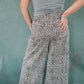 The Super High Rise Wide Leg Leopard Jeans - Bottoms - Pants - Saige Denim
