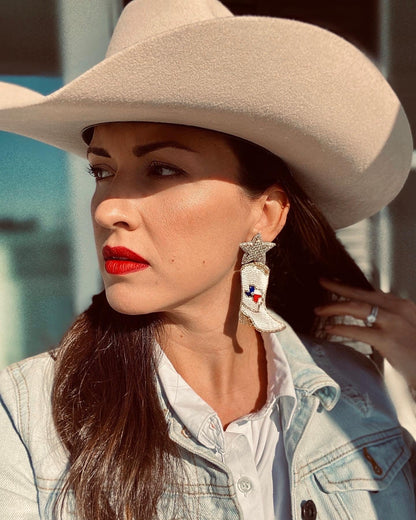 Inspired by the Texas Cowgirl, we made a special edition of cowboy boot earrings with the shape of Texas embroidered in the center.  A Star made with rhinestones, white and gold glass beads that make a perfect set of feminine cowboy boot earrings.