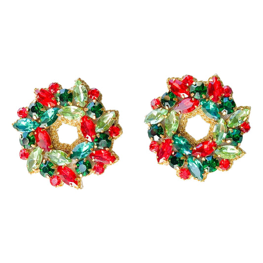 Celebrate the Holidays with these festive wreath stud earrings. Made with beautiful and shiny stones and crystals. They have a perfect size to match many of your Holiday outfits. Made for those that want a festive and classy look.  Size 1.4" x 1.4" Super lightweight 14k gold plated hardware