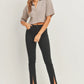 Elevate your denim game with the JUST BLACK DENIM Mid Rise - Split Hem Slim Jeans. The mid rise design offers a flattering fit that sits comfortably on your hips, creating a sleek and modern silhouette that effortlessly complements your shape. 10.5" rise and a 30" inseam. The 7" split hem adds a dash of flair and timeless appeal. Pair these jeans with your favorite heels for an elevated look, or embrace a more laid-back vibe with sneakers or ankle boots. 