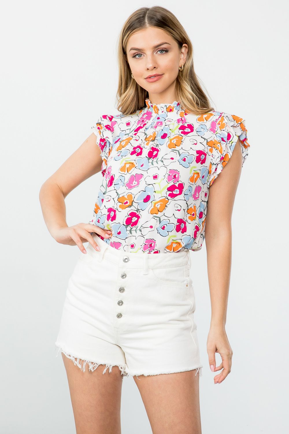 Lovely Me top. THML top. The BEST everyday top there is for SPRING!! This floral printed top is light-weight with ruffle sleeves. 