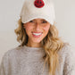 Red glitter smiley cap on an sherpa adjustable ball cap.  One size fits all. 