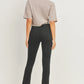 Elevate your denim game with the JUST BLACK DENIM Mid Rise - Split Hem Slim Jeans. The mid rise design offers a flattering fit that sits comfortably on your hips, creating a sleek and modern silhouette that effortlessly complements your shape. 10.5" rise and a 30" inseam. The 7" split hem adds a dash of flair and timeless appeal. Pair these jeans with your favorite heels for an elevated look, or embrace a more laid-back vibe with sneakers or ankle boots. 