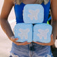 With their small compact size these minis are perfect for holding your on the go makeup collection, jewelry favs, or a throw all in your purse. Pair it with our any of our other medium, large, or xl makeup bags to create the dreamiest bathroom counter addition. Beaded Airplane patch is SEWN on.