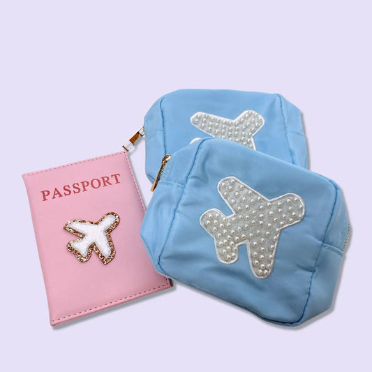 With their small compact size these minis are perfect for holding your on the go makeup collection, jewelry favs, or a throw all in your purse. Pair it with our any of our other medium, large, or xl makeup bags to create the dreamiest bathroom counter addition. Beaded Airplane patch is SEWN on.